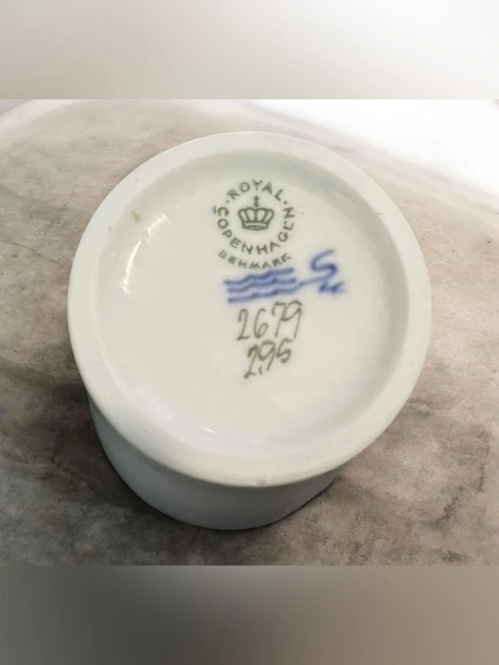 MCM Royal Copenhagen porcelain vase with hand-painted floral motifs.